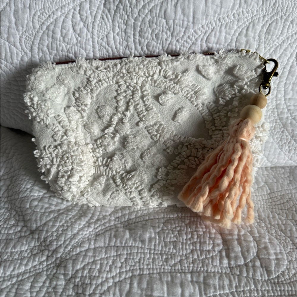 Elegant White Textured Clutch with Tassel